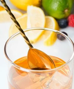 Mercer Barfly 12.4" Bar Spoon With Fork | Gold Plated 11 Mercer Barfly 12.4" Bar Spoon With Fork | Gold Plated -Glassware & Drinkware Shop mercer barfly gold plated bar spoon with fork stirringimage